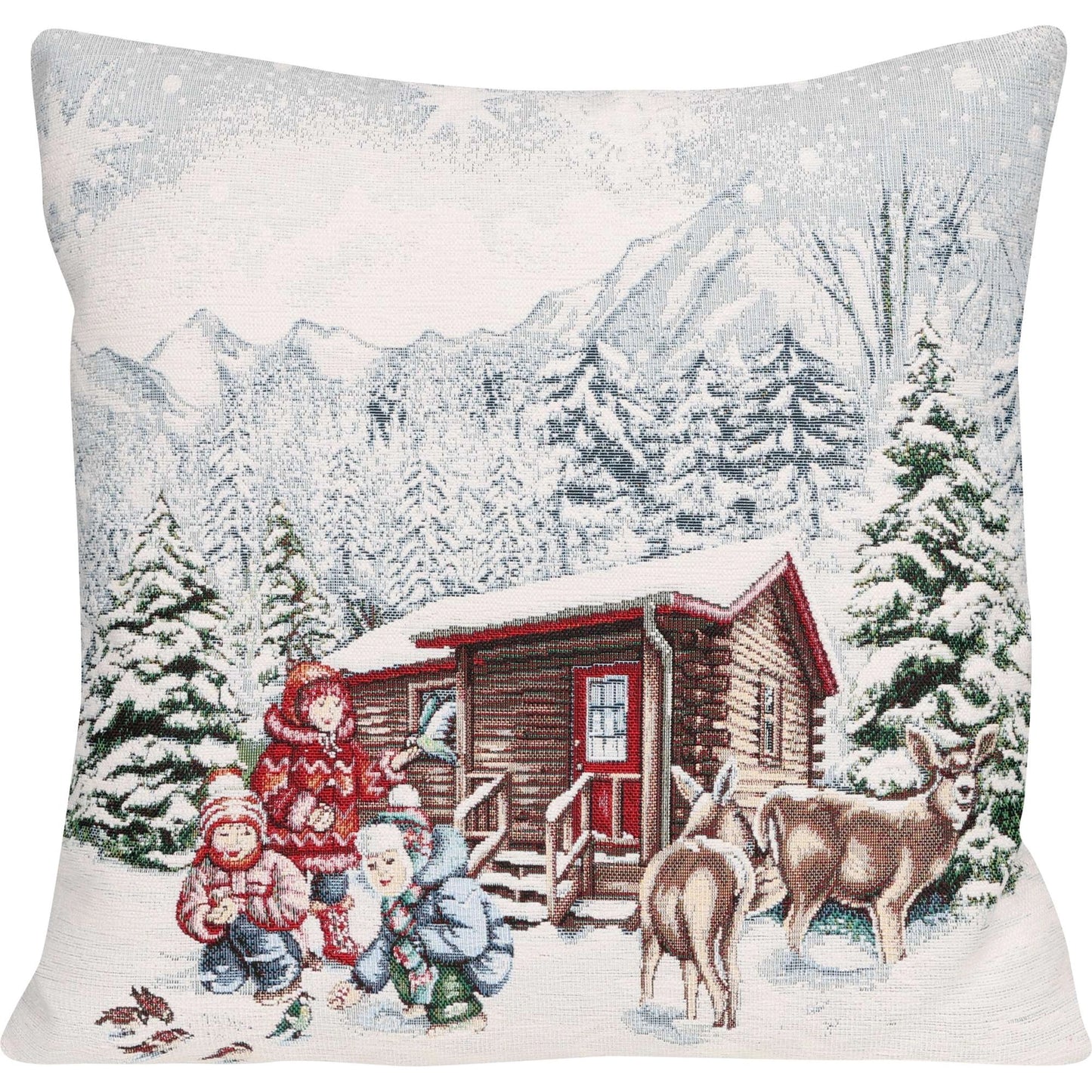ine quadratische Kissenhülle mit einem sehr detaillierten, winterlichen Motiv. Es zeigt eine verschneite Berglandschaft mit Tannenbäumen und einer rustikalen Holzhütte. Im Vordergrund sind drei Kinder in Winterkleidung zu sehen, die Vögel füttern, und in der Nähe stehen zwei Rehe. 